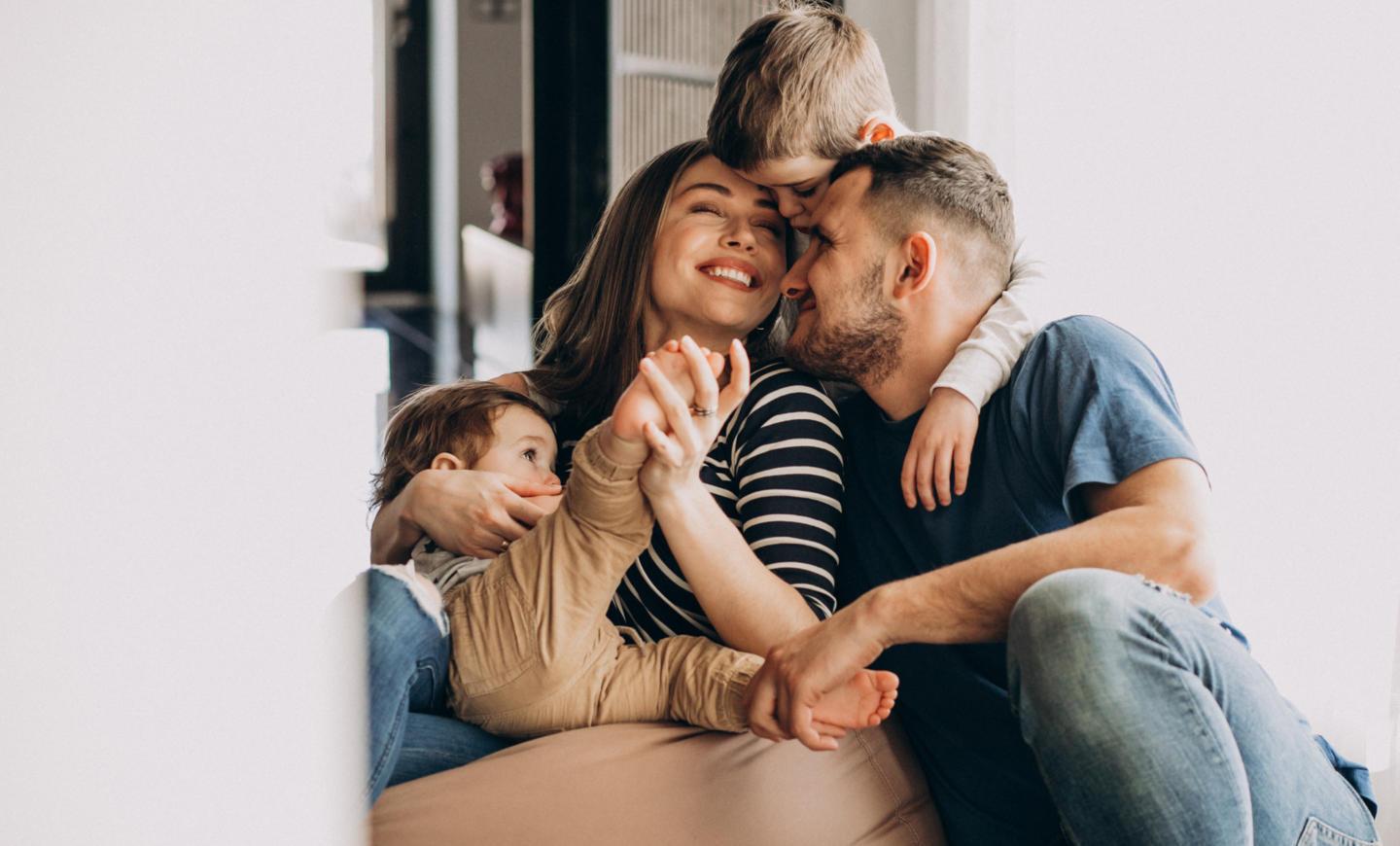 young-family-with-their-sons-home-having-fun.jpg