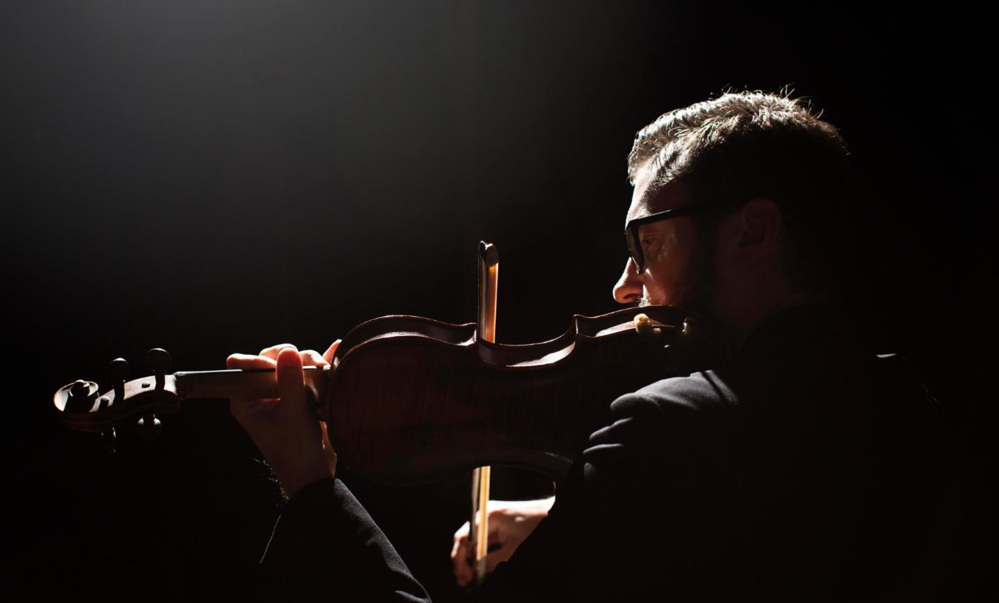side-view-male-musician-playing-violin.jpg