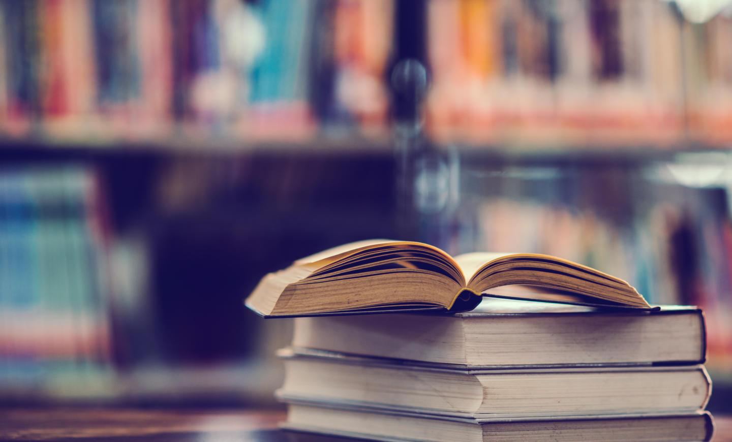 book-library-with-open-textbook.jpg